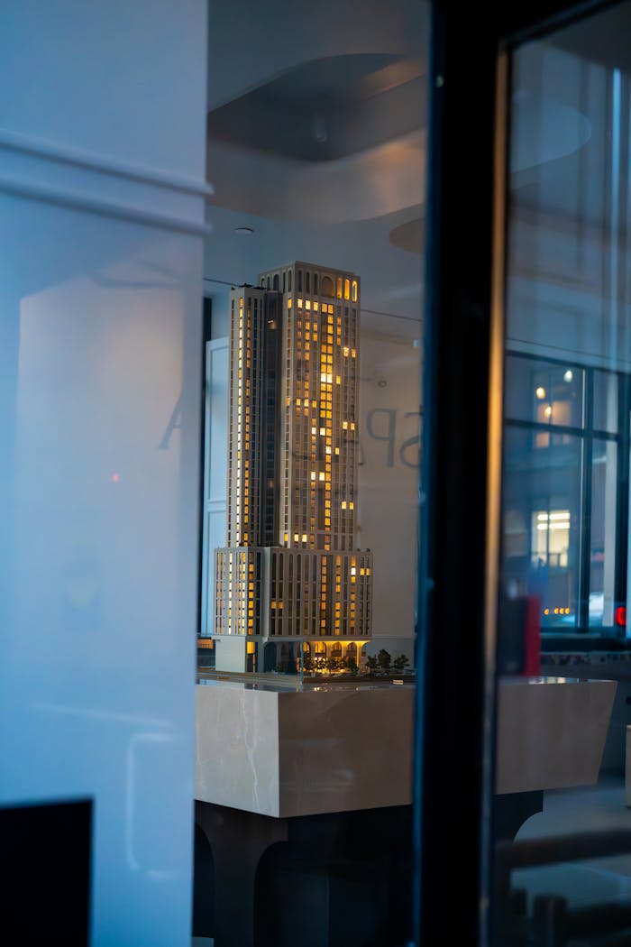 A detailed architectural scale model of a proposed skyscraper in Toronto, captured indoors.